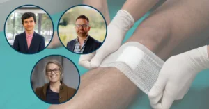 Dr Liezhou Zhong, Professor Josh Lewis and Dr Lauren Blekkenhorst in front of an image of a leg being bandaged by someone's hands wearing white gloves.